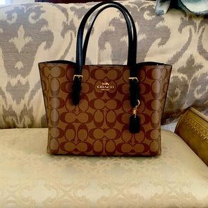 Womens Coach tote used only a few times new condition.
